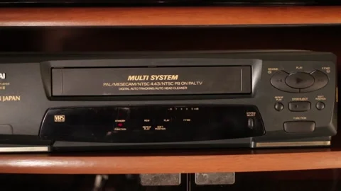 Ejecting Tape from VHS Recorder Stock Footage 242387929