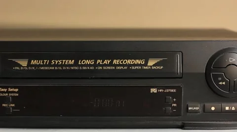 Ejecting the video cassette from the VCR or VHS Stock Footage 49129755