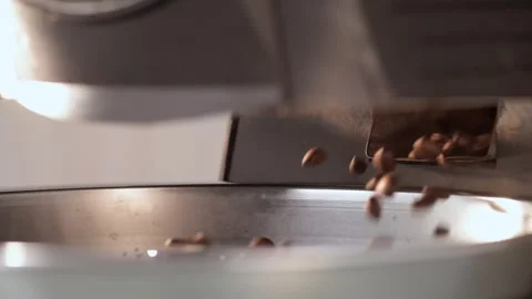 Ejection of Freshly Roasted Coffee Beans into Cooling Tray, Slow Motion Stock Footage 247660790