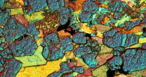 Eklogit thin section of stone under the microscope Stock Footage 136448198