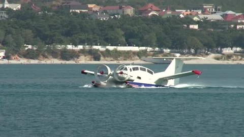 Ekranoplan Oriole with two huge rotating screws floats like boat. Stock Footage 132980125