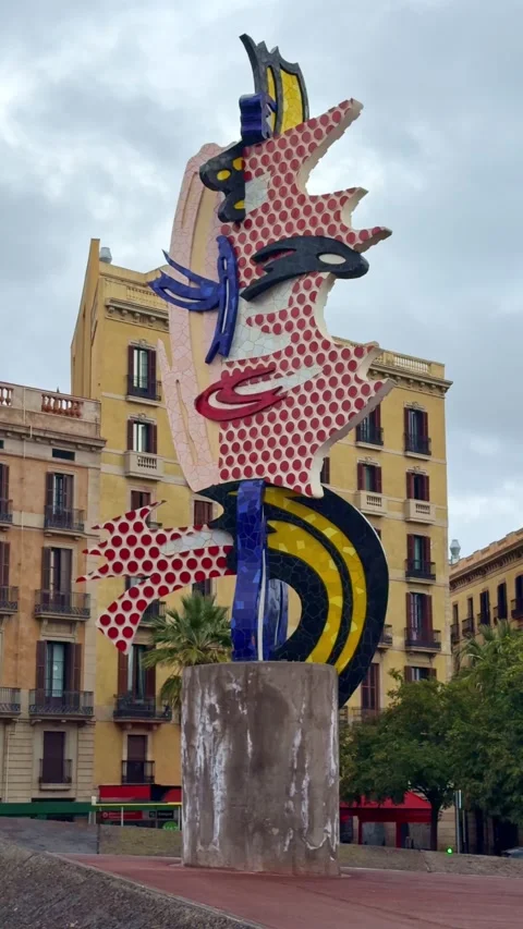 El Cap de Barcelona by Roy Lichtenstein, a colorful Pop Art sculpture in Stock Footage 342340801