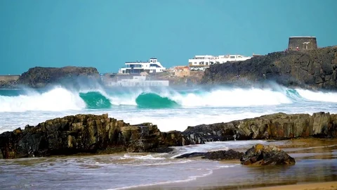 El Cotillo, beach, waves and view to the tower Stock Footage 104769983