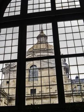 El Escorial Monastery tower through a window Stock Photos
