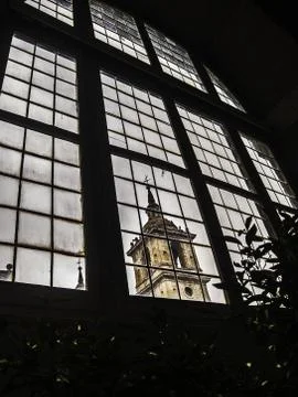 El Escorial Monastery tower through a window Stock Photos