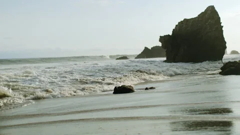 El Matador Beach Small Wave Under Setting Sunlight 4K 48FPS SLO-MO Stock Footage 196355025