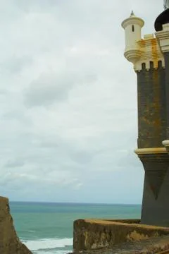 El morro main tower at old san juan puerto rico with sea Stock Photos