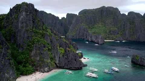 El Nido Limestone Cliffs and Coral Reefs - Drone 1 Stock Footage 303564725