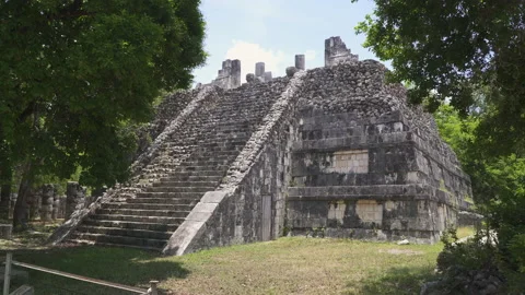El Osario, a step-pyramid temple in ancient Mayan city of Chichen Itza Stock Footage 156702435