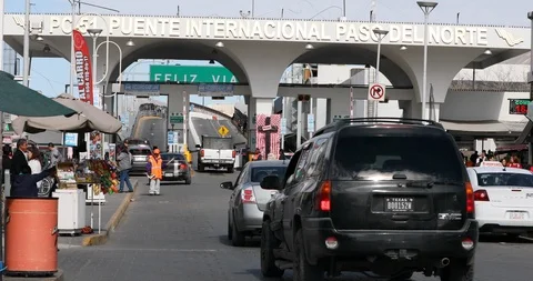 El Paso Texas border crossing into Ciudad Juarez Mexico traffic 4K Stock Footage 102825198