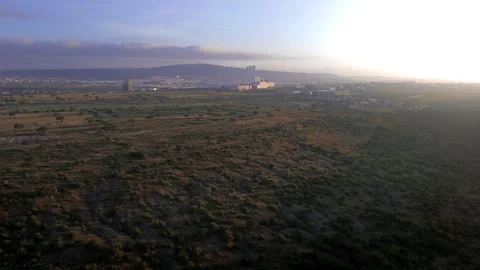 El Refugio and Paseo Queretaro shopping mall aerial sunset view drone POV Stock Footage 344589708