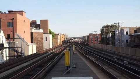 El Train approaches / between the tracks Stock Footage 242921107