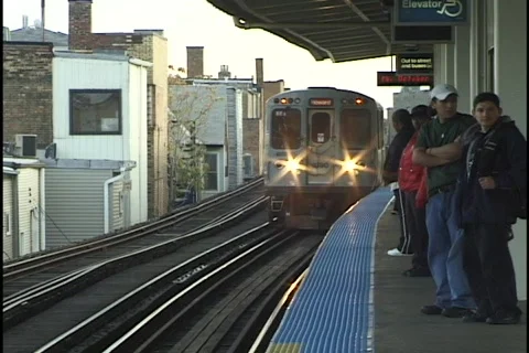 El-Train Arrives at Station Stock-Footage 297024
