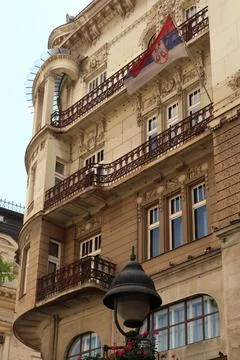 The elaborate facade of the Serbian Academy of Sciences and Art with a Serb.. Stock Photos