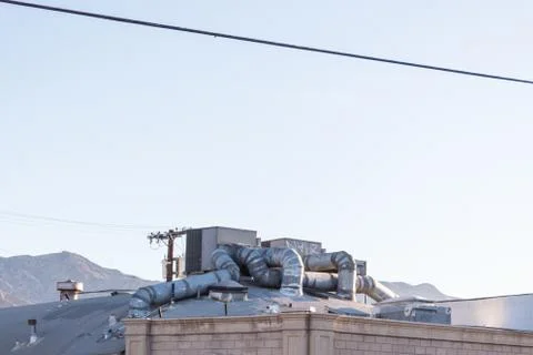 Elaborate heating and cooling system on the roof of a building with elaborate Stock Photos