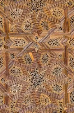 Elaborate star texture pattern on wooden door of mosque in Fez, Morocco, North Stock Photos