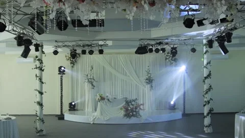 Elaborate wedding reception stage decoration with elegant white drapes, Stock Footage 342230933