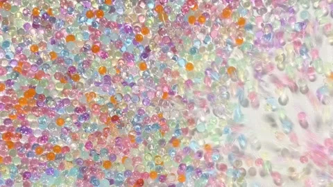 Elastic multicolored balls fall asleep and jump and fill the entire background. Stock Footage 277438146