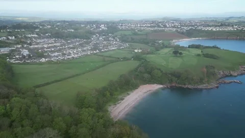 Elberry Cove, S. Devon, England: DRONE VIEWS: Cove beach, Churston &amp; Broadsands Stock Footage 240543314