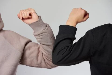 Elbow bumping to avoid the spread of coronavirus 스톡 사진