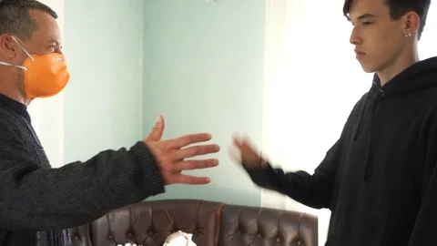 Elbow bumps instead of handshakes  in the coronavirus era Stock Footage 126507455