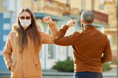 Elbow greeting to avoid the spread of coronavirus Stock Photos