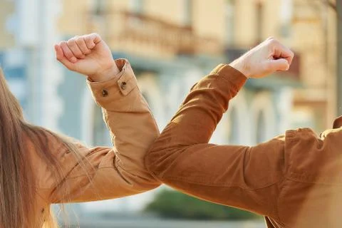 Elbow greeting to avoid the spread of coronavirus Stock Photos