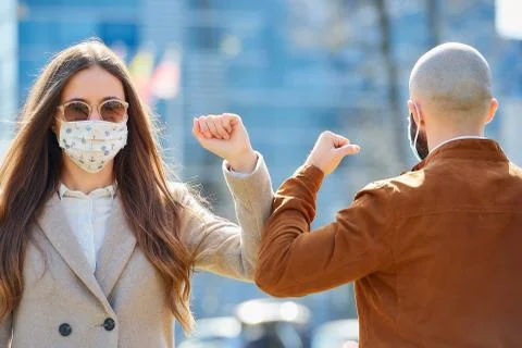 Elbow greeting to avoid the spread of coronavirus Stock Photos