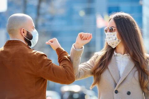 Elbow greeting to avoid the spread of coronavirus Stock Photos