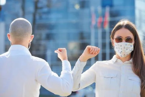 Elbow greeting to avoid the spread of coronavirus Stock Photos