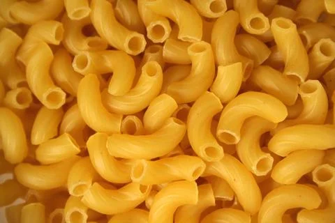 Elbow macaroni background texture Stock Photos