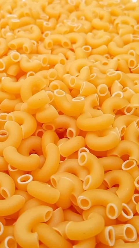 Elbow Macaroni Pasta Dropping on Uncooked Elbow Macaroni Ingredient, Food  Vidéo 334368289
