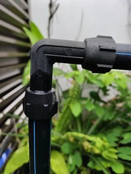 The elbow poly pipe leaking Stock Photos