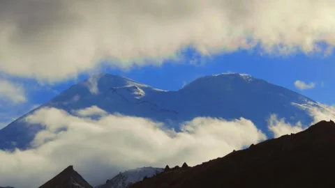 Elbrus, Elbrus hides behind clouds, snow-capped mountain peaks 스톡 동영상 278603679
