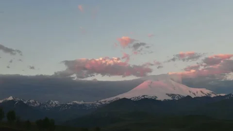 Elbrus mount with pink clouds at sunrise timelapse. Stock Footage 219962881