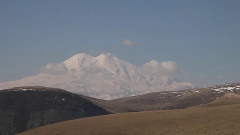 Elbrus mountain in the clouds (caucasus) Stock Footage 83775935