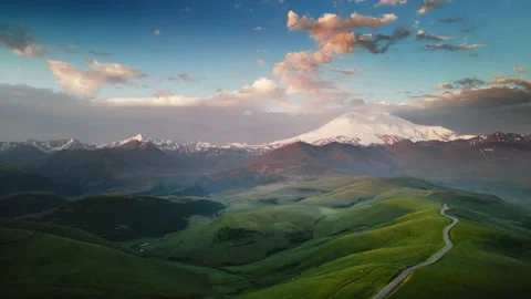Elbrus mountain with pink clouds at sunrise. Video stock 232199002