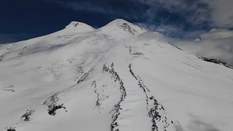 Elbrus Summit with Double Peak under Snow. Aerial View Stock Footage 157712537