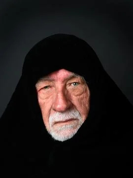 Elder arab sheik with a somber expression Stock Photos