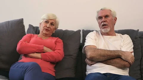 Elder couple quarell while watching tv. Stock Footage 102569655