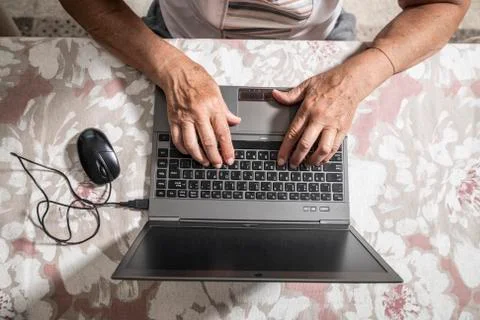 An elder lady using a laptop Foto stock