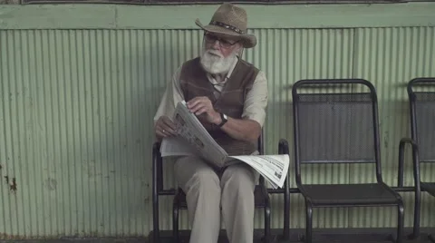 Elder Man With Newspaper Stock-Footage 64146393