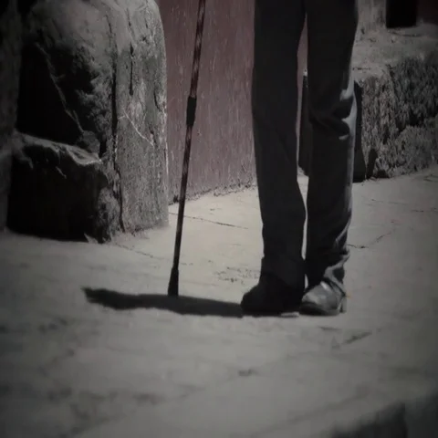 Elder man using a walking stick Stock Footage 69635102