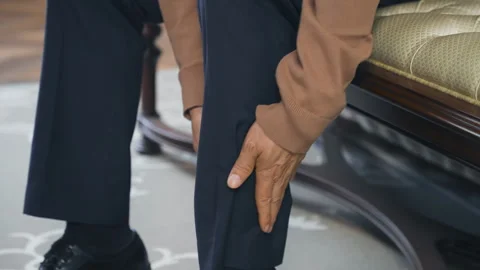Elder mature man hands massaging leg calf muscle cramps, trauma from Stock Footage 337271876
