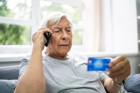 Elder Scam Call And Senior Pension Fraud Stock Photos