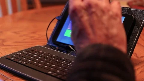 Elder Using PC Tablet Stock Footage 81809035