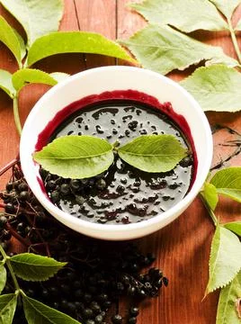 Elderberry jam on wood Stock Photos