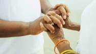 An Elderly African American Couple Holding Hands Outdoors On The Beach Enjoying Stock Footage