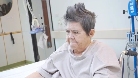 The elderly are training  Raise arms alternately up and down  To do physical  Stock Footage 124939640