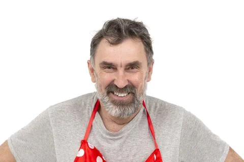 Elderly bearded man smiling at the camera on a white background. Stock Photos